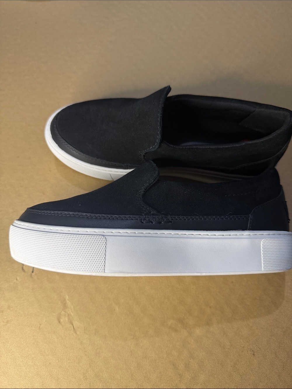 UGG Men's Black Slip-On Suede Loafers with White Platform Sole. Worn a few times